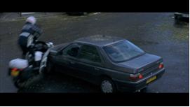 Finally, we see the action of a motorcyclist crashing into a civilian vehicle, broken into three separate edits. By fragmenting the single event, the collision gains a quality of dissonance. This tendency of jarring discord seeks to startle the viewer, illustrating the films preference for emotional response over a unity of the progression of events.